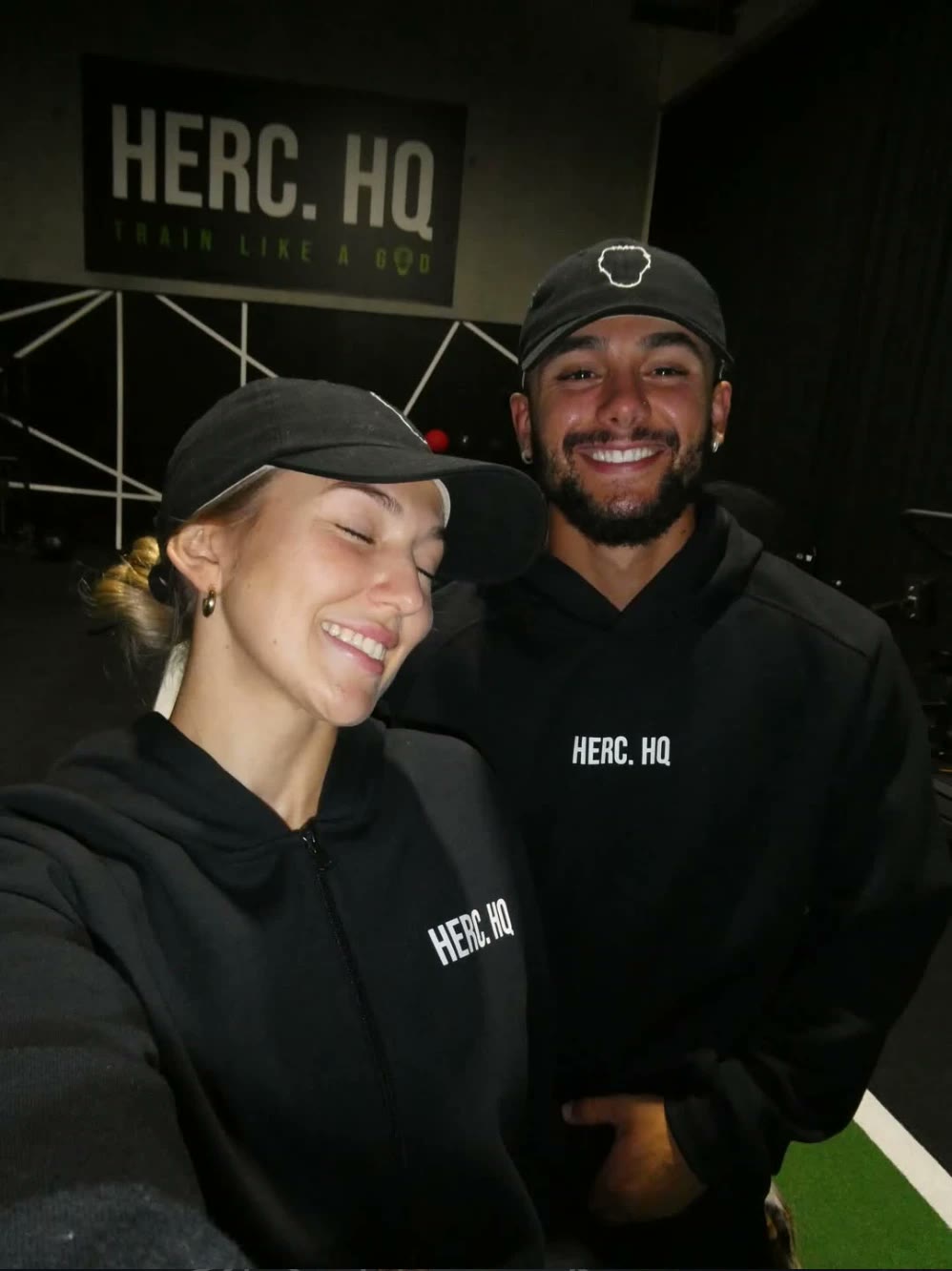 The HERC. team in HERC. HQ, wearing their own printed gear